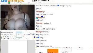 Omegle girl playing with huge tits