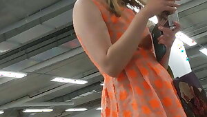 Sexy Blonde in orange dress skirt (part1)