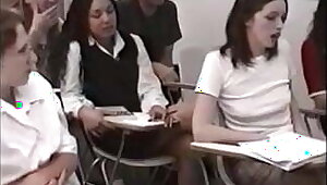 schoolgirls are punished by female teacher in the classr