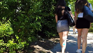 2 candid teens in short and tight skirts