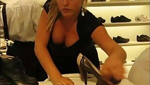 Blonde Downblouse at a Shoe Store