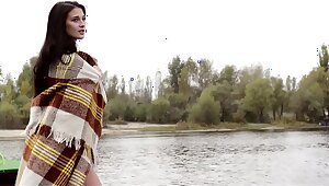 Beautiful babe posing on a boat