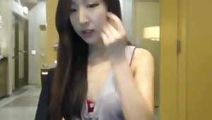 Amateur korean girl strips in an office